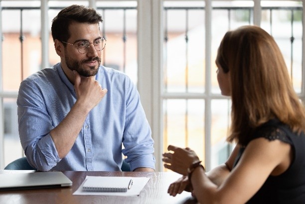 Two people talking