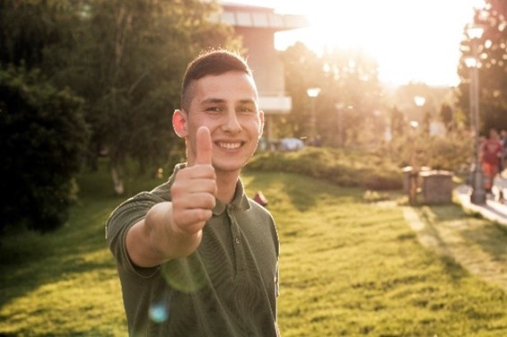 Person giving thumbs up